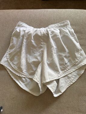 Nike Women’s White Athletic Running Shorts with Silver Swoosh